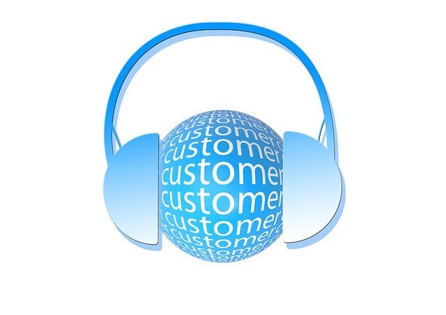 Listen to your customers Blue headphones with a globe filled with the word "customer."