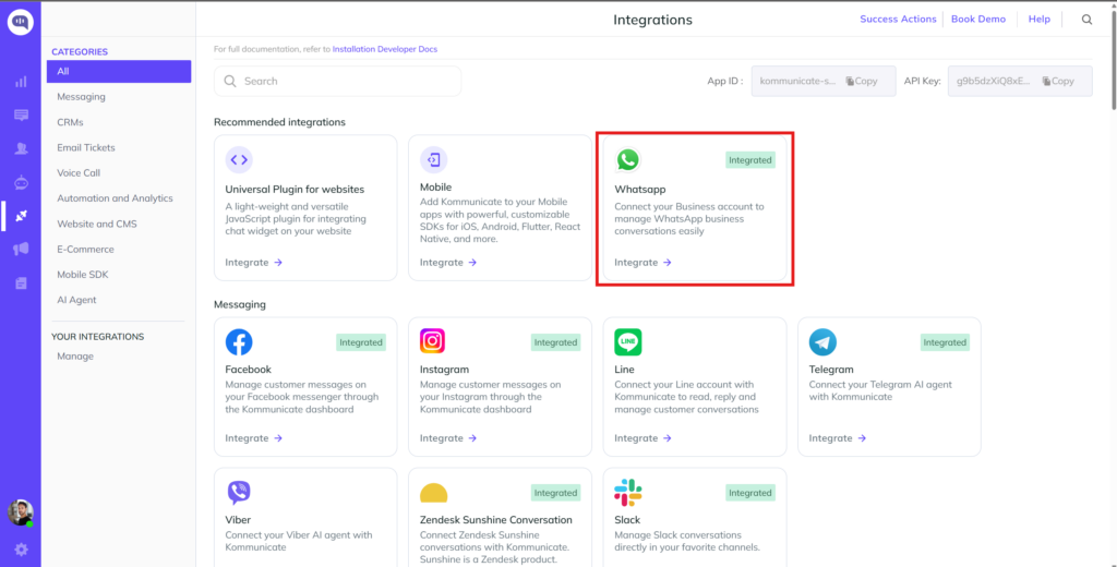 Kommunicate Integrations dashboard showing the WhatsApp integration card highlighted for connecting WhatsApp API credentials.