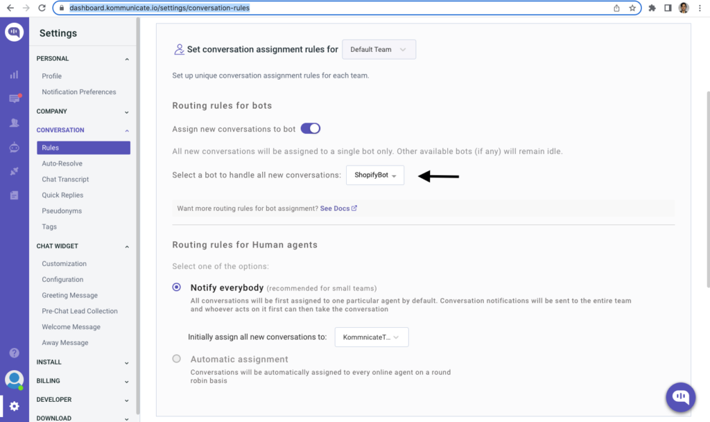 Screenshot of the Kommunicate settings page, showing configuration options for conversation assignment rules, including routing rules for bots and human agents."