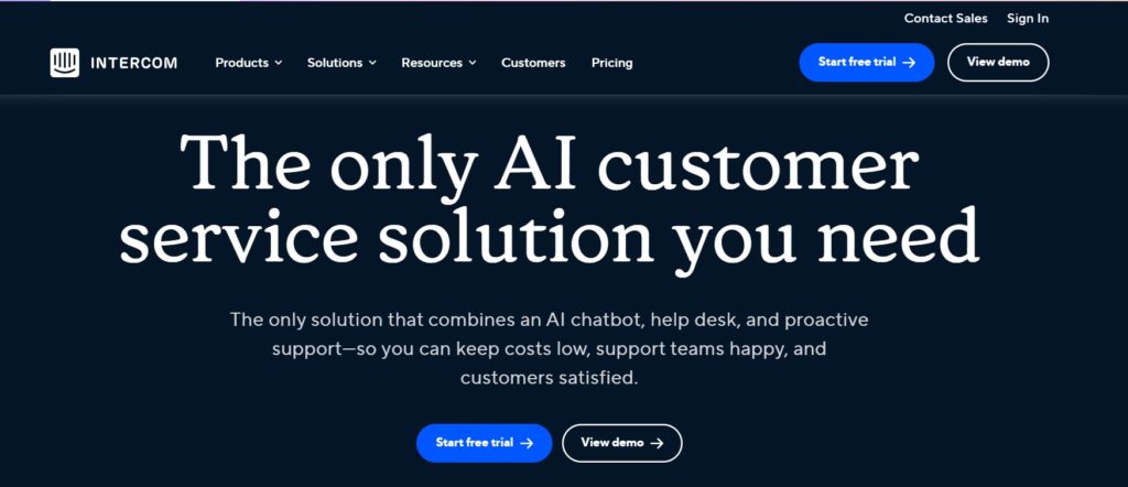 Intercom homepage with a dark background and white text. The headline reads "The only AI customer service solution you need" with subtext describing Intercom's combination of chatbot, help desk, and proactive support features. Prominent "Start free trial" and "View demo" buttons are at the bottom. The Intercom logo and navigation menu are in the top left corner. Intercom homepage with a dark background and white text. The headline reads "The only AI customer service solution you need" with subtext describing Intercom's combination of chatbot, help desk, and proactive support features. Prominent "Start free trial" and "View demo" buttons are at the bottom. The Intercom logo and navigation menu are in the top left corner.
