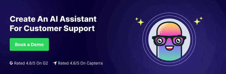 Create an AI Assistant for Customer Support - Book a Demo. Rated 4.8/5 on G2 and 4.6/5 on Capterra." The image features a Kompose by Kommunicate's logo consisting of smiling AI character with glasses and sparkles around it, set against a dark purple background. A green button invites users to "Book a Demo" for AI customer service platform, Kommunicate.