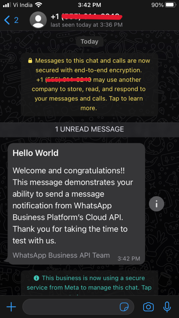 WhatsApp chat screen showing a notification about end-to-end encryption and a welcome message from the WhatsApp Business API Team.
