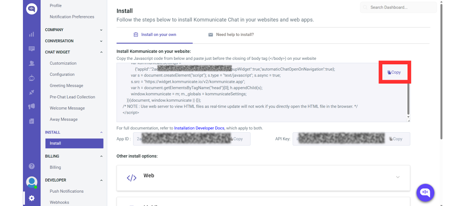 Copy the Custom JavaScript Code from Kommunicate Dashboard Kommunicate dashboard displaying the 'Install' page under Settings, with a highlighted 'Copy' button next to the custom JavaScript code snippet for installing the AI agent using the <body> tag.