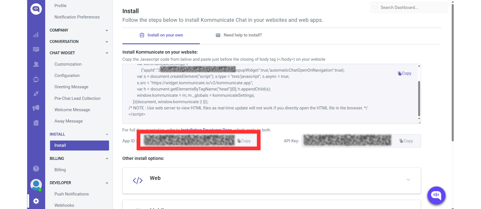Replace the APP ID with the code Screenshot of the Kommunicate dashboard's "Install" section showing the JavaScript code snippet used to embed the chat widget on a website. The "App ID" field is highlighted in red, indicating where users should copy and paste the unique ID from this screen into their website code. The left sidebar menu includes sections like Chat Widget, Install, Billing, and Developer.