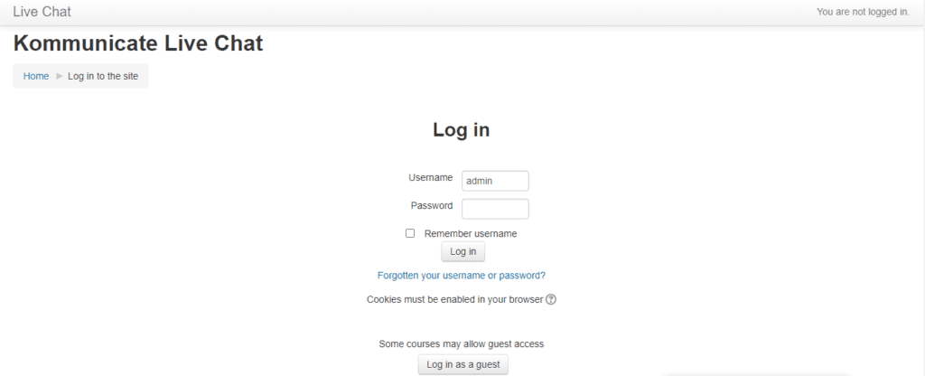Moodle login page for Kommunicate live chat, showing username and password fields with options to remember username, log in as guest, or reset password.