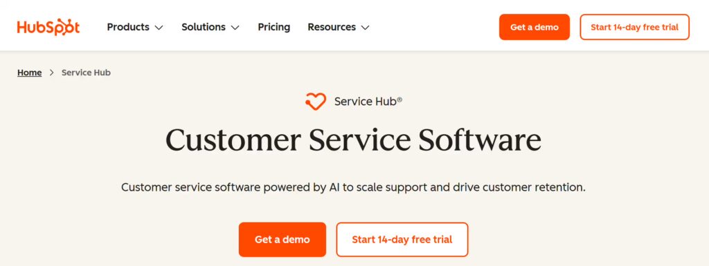 HubSpot Service Hub homepage showing “Customer Service Software” with AI-powered support messaging and call-to-action buttons for demo and free trial.