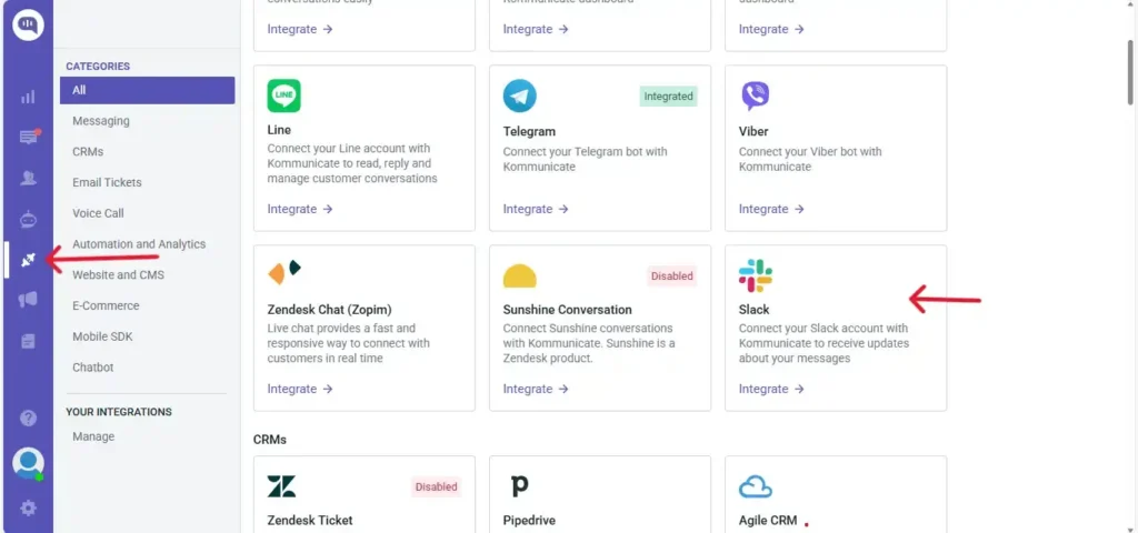Select Slack in Kommunicate Integrations Kommunicate dashboard showing the Integrations page, with arrows highlighting the integrations menu and the Slack integration option.